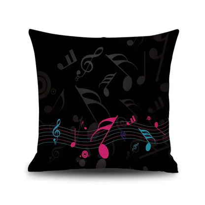 Black linen throw pillow with vibrant pink blue and gray notes piano graphic for living room decorbites letter notes
