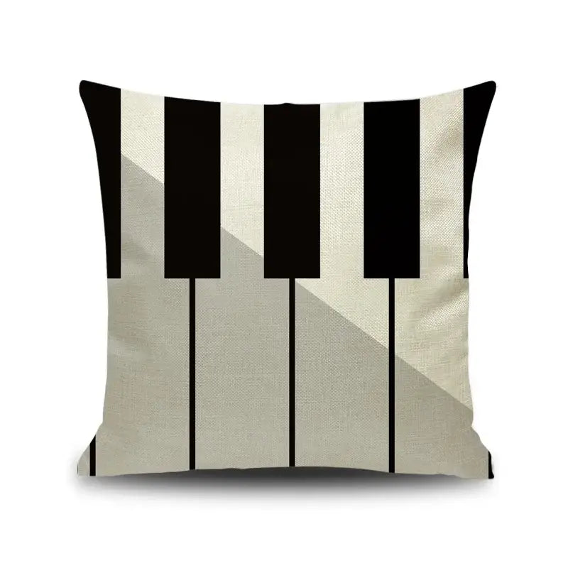 A linen square pillow cover with a minimalist black and beige notes piano graphic for living room decorbites decor