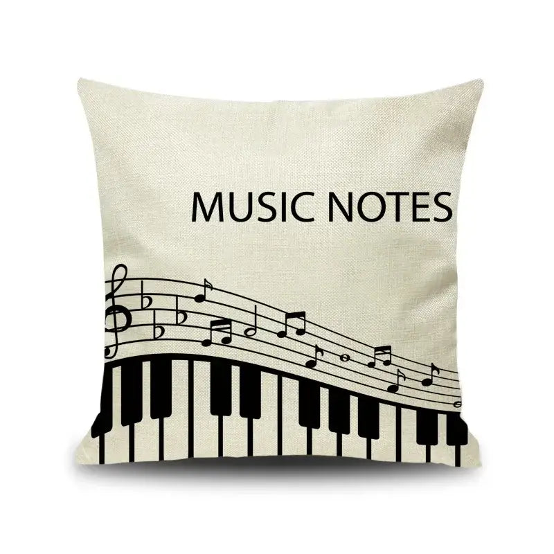 Beige linen throw pillow with black letter notes piano graphic and music notes text for living room decorbites decor
