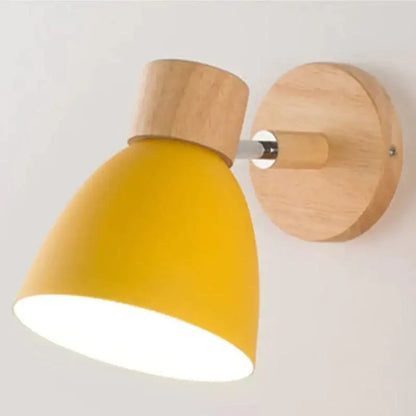 Yellow conical joan wooden reading wall sconce with natural wood base and mounting plate for bedroom lighting