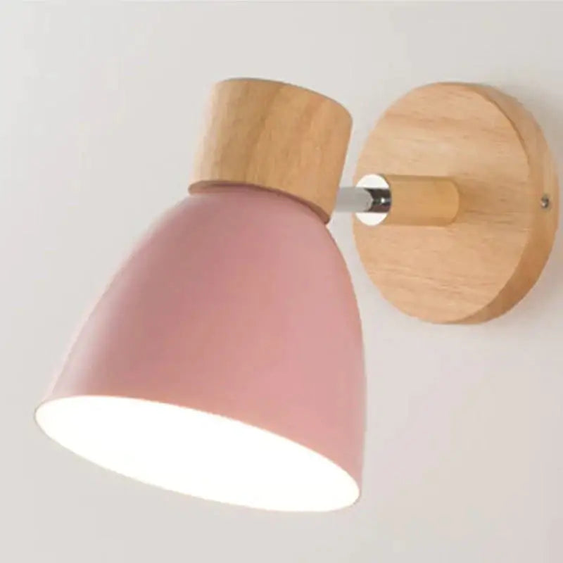Pink matte finished joan wooden reading wall sconce with natural wood base for bedroom lighting