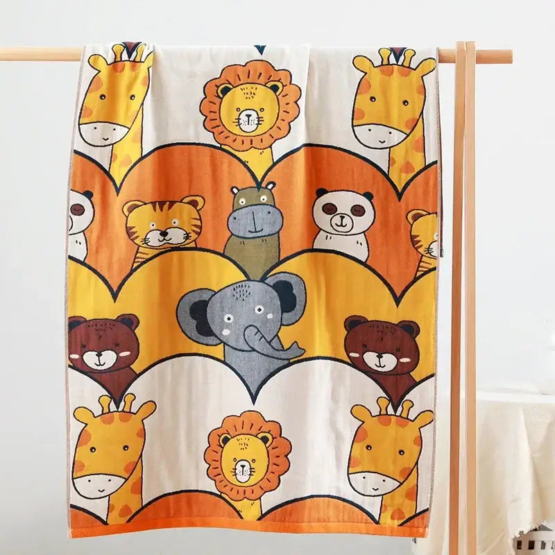 A soft white cotton gauze bath towel with kids cute cats and cartoon animals pattern for bathroom decorbites kids cute