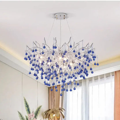 A modern kids pink crystal chandelier with silver frame and blue glass orbs for bedroom decorbites kids pink decor