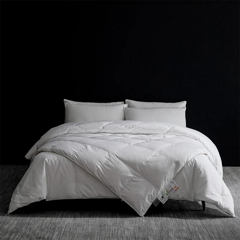 White quilted king size goose down and silk duvet set with plush texture and subtle stitching for master bedroom luxury