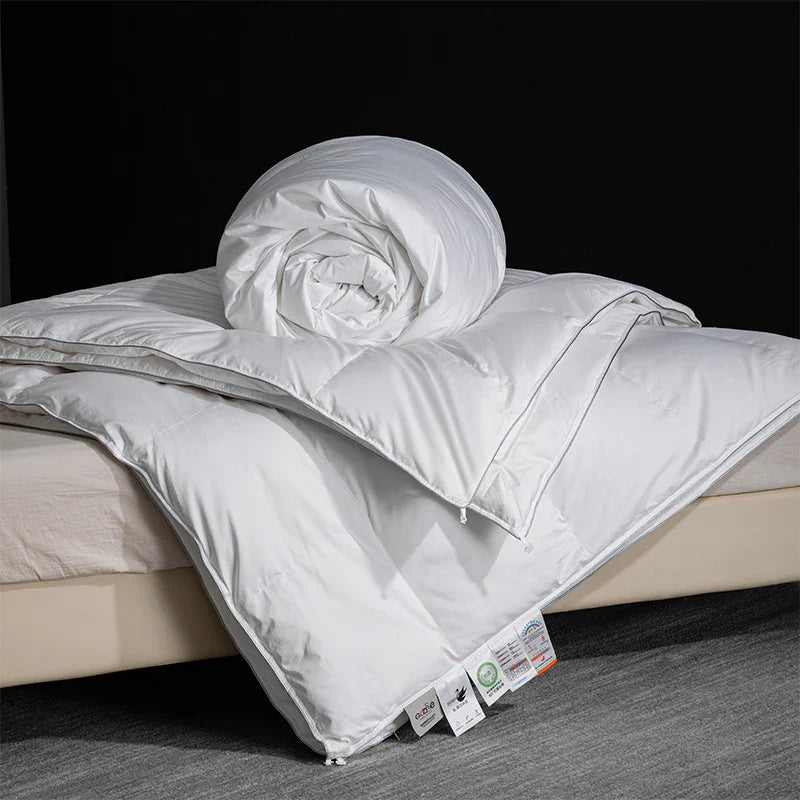 King size white quilted goose down and silk duvet set with plush texture and subtle stitching for master bedroom luxury