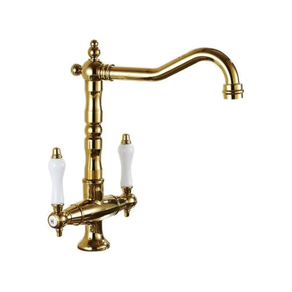 Gold-finished single hole kitchen faucet with two white ceramic handles and a 360 degree swivel curved spout made of brass