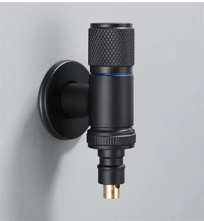 Black matte-finished wall-mounted washing machine faucet with knurled handle and brass tip by decorbites black copper brass