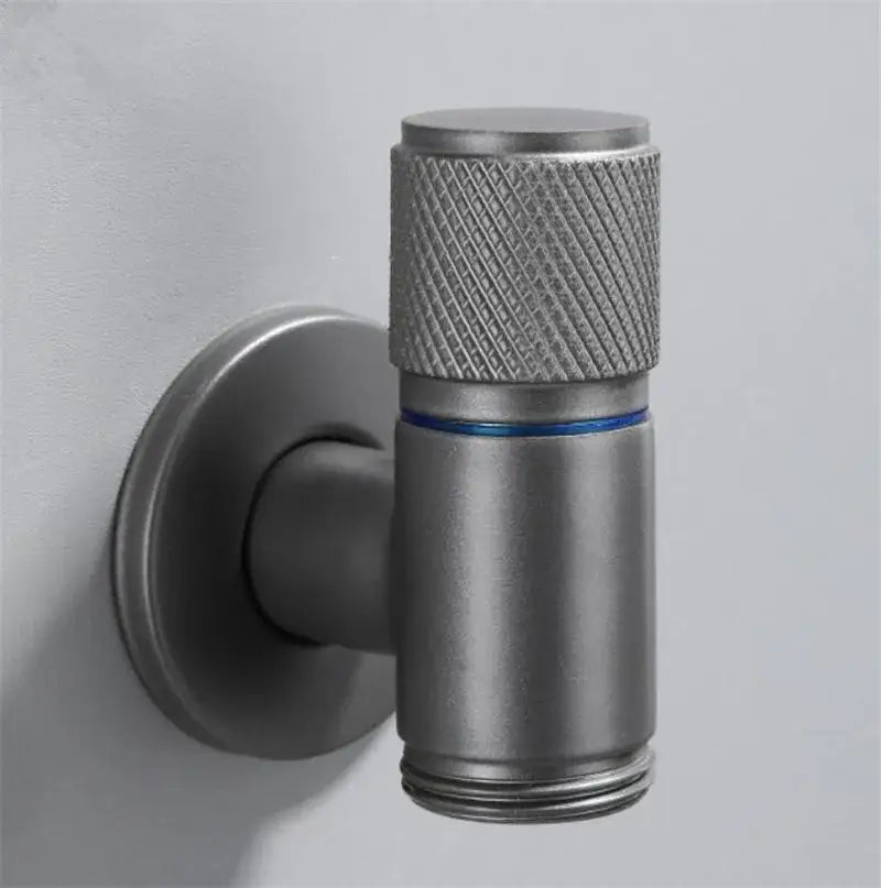 Matte finished black copper brass washing machine faucet with brushed steel knurled handle and blue accent ring decorbites