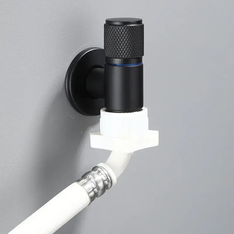 Knurled black copper brass washing machine faucet with black matte finish and blue accent connected to white pvc piping