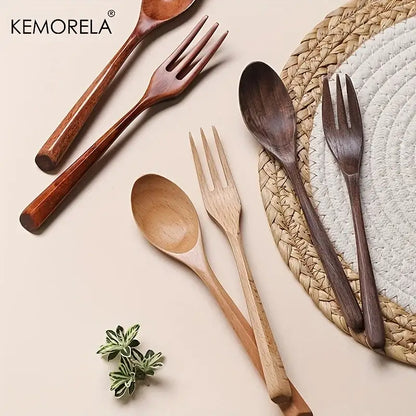 Korean style natural wooden fork and spoon set in smooth finished natural wood tones for dining room use