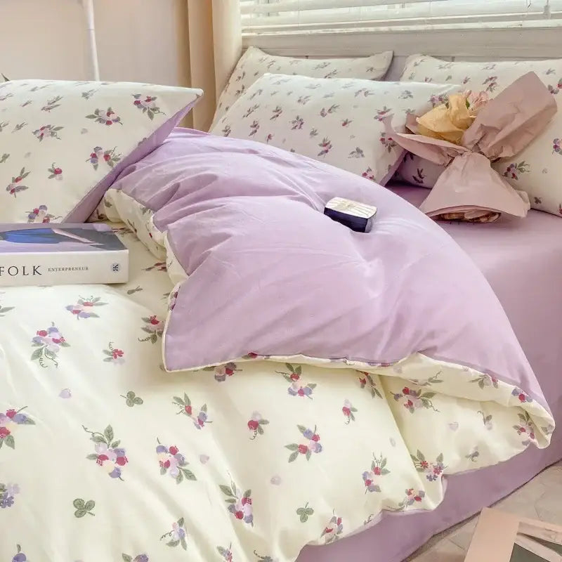 Lavender and pink floral cotton bedding set showing the back side with cozy pattern printed soft fabric and matching pillowcases
