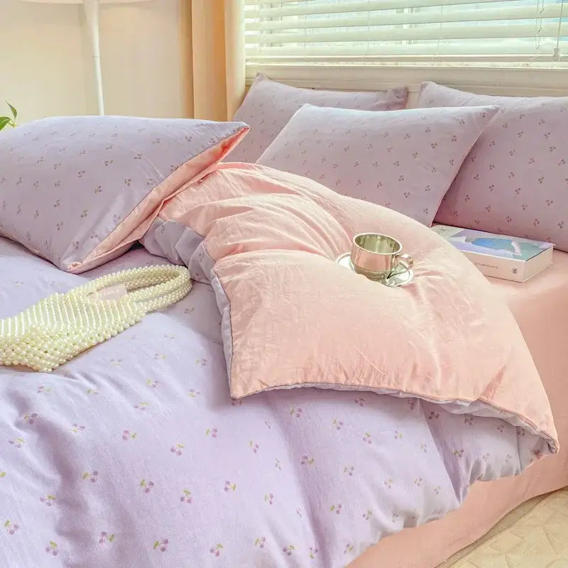 Pastel lavender and pink cherry-print double layer yarn bed sheet set with soft quilted fabric for cozy bedroom use
