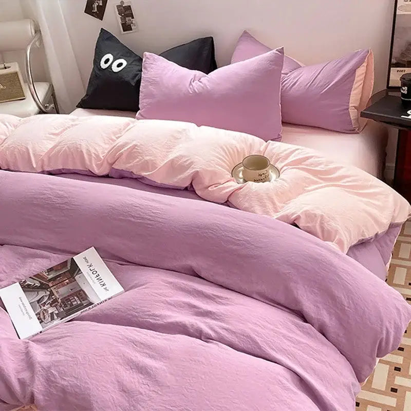 Soft lavender cotton bedding set with duvet and pillowcases plus black accent pillow with white cartoon eyes