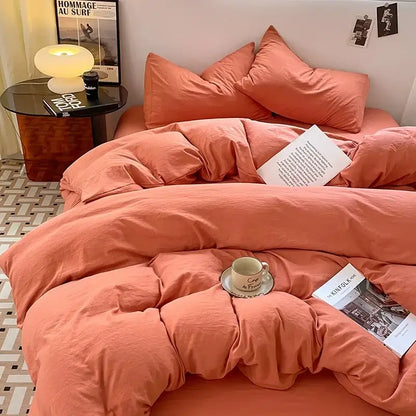 Coral-colored soft cotton bedding set with cozy slightly wrinkled texture from lavender and black cotton bedding collection