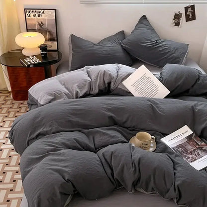 Gray textured cotton bedding set with matching pillows featuring a cozy rumpled appearance for soft cotton bedding