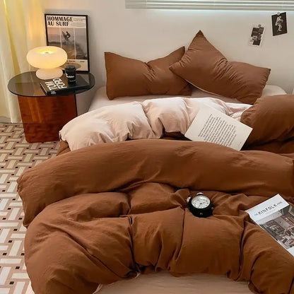 Warm brown plush quilted comforter in lavender and black cotton bedding set with soft cotton texture and subtle stitching details