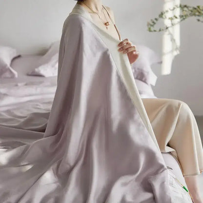 A soft lavender silk robe with flowing draped design and subtle sheen complements decorbites light luxury jacquard quilt set