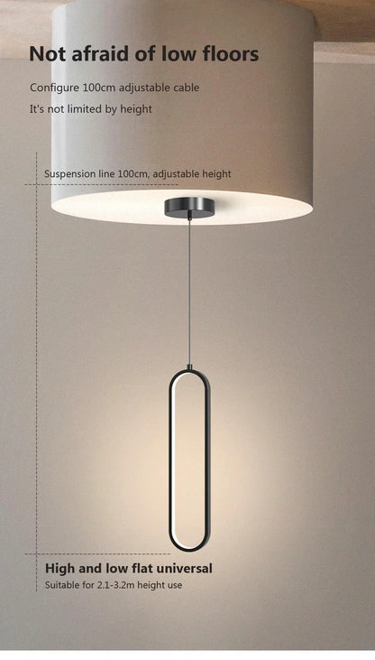 Modern minimalist black gold led pendant light with elongated oval metal frame and cylindrical beige lampshade for indoor decor