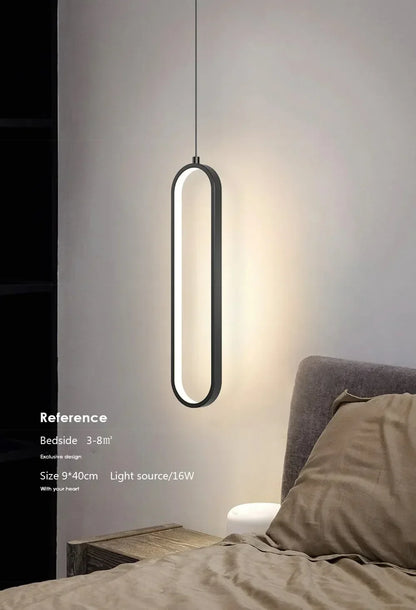 Modern black gold pendant light with oval frame and integrated led lighting for indoor decor and living spaces
