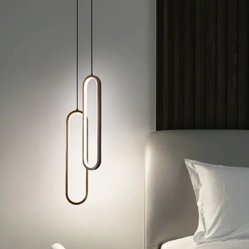 Modern minimalist black gold led pendant light with sleek oval brass frames for bedroom living room and kitchen decor