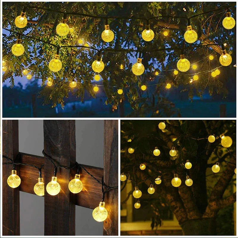 String lights featuring warm white solar crystal globe bulbs with textured glass finish for outdoor garden use