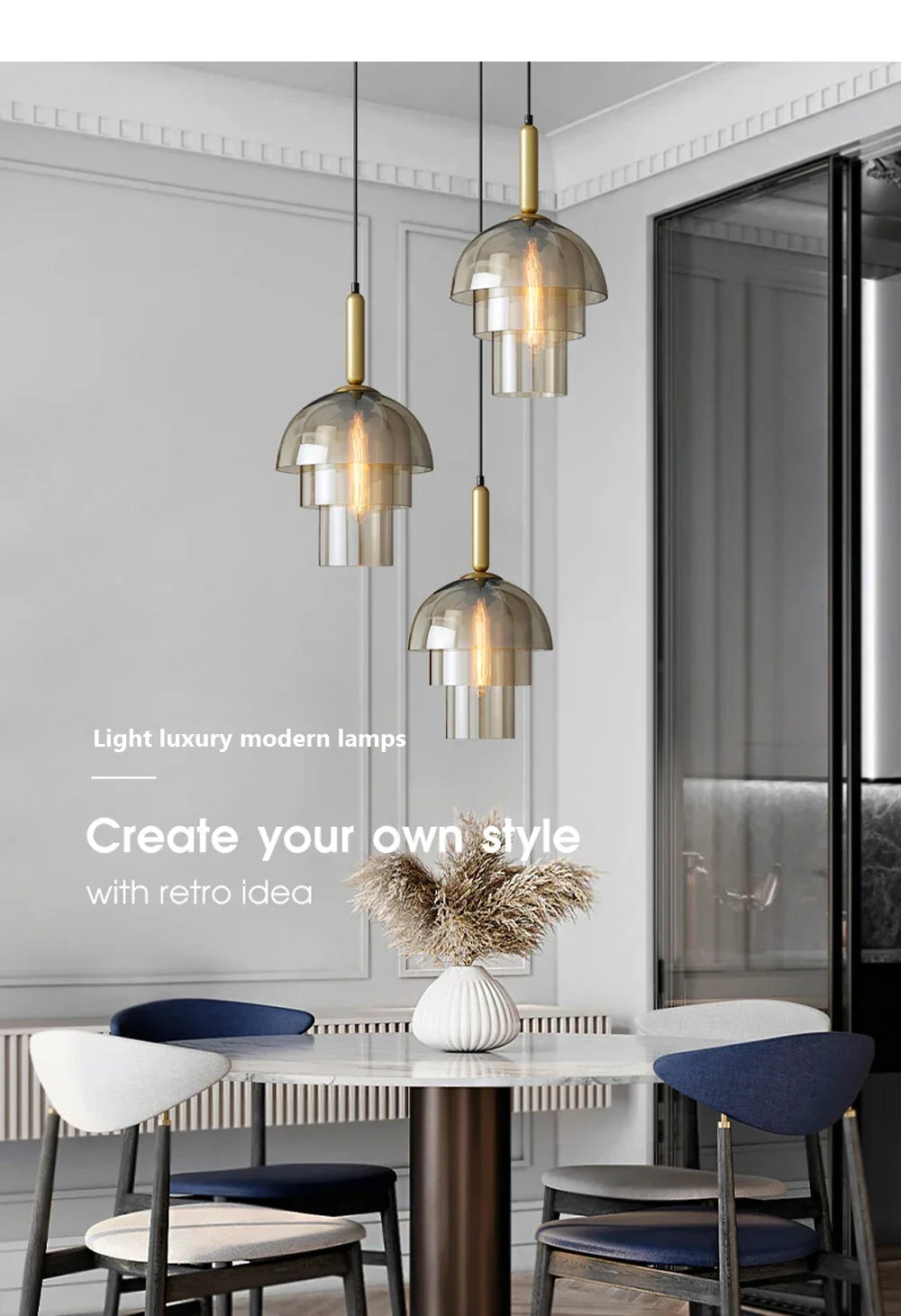 Three tiered glass pendant lights with brass accents in champagne finish hang above dining table for vintage decor
