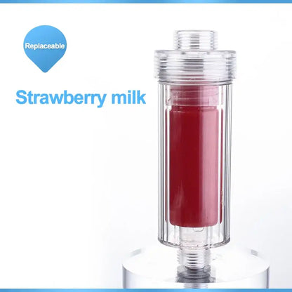 Clear cylindrical vitamin c shower filter cartridge filled with red strawberry milk with threaded caps for decorbites lemon vitamin