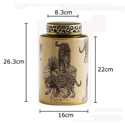 Beige ceramic storage jar with gold trim and black leopard pattern featuring matching leopard print lid decorbites leopard pattern