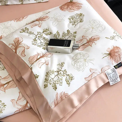 A silver perfume bottle with a black label on a white satin pillow sham with leopard print decorbites leopard print design