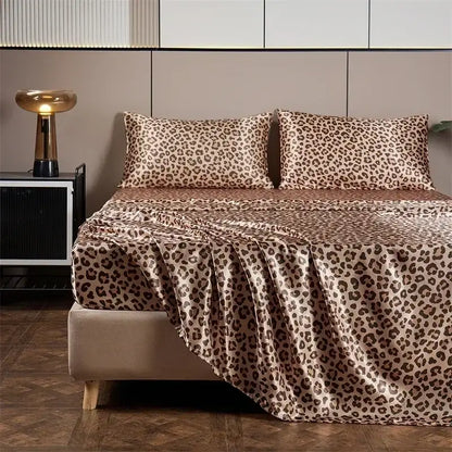 Leopard print satin bedsheet set in beige and brown with a glossy leopard print satin finish and matching pillows