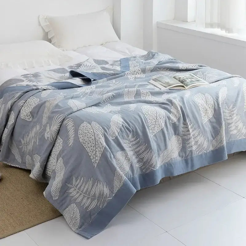 Light blue and white leaf cotton gauze towel throw with soft fabric and quilted design for bedroom decorbites cotton gauze