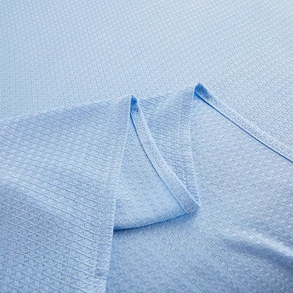 Light blue bamboo fiber summer quilt with a subtle woven pattern diamond grid design by decorbites bamboo fiber