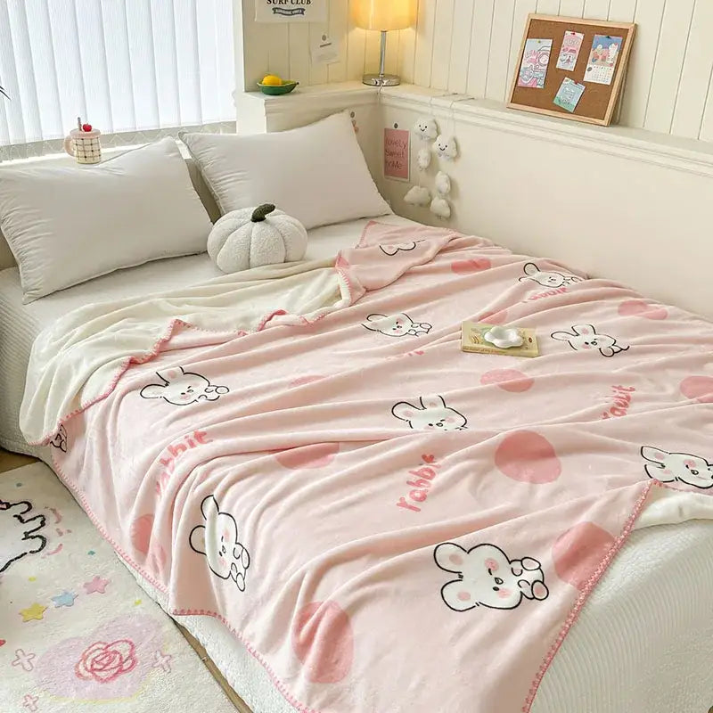 Pink plush milk velvet blanket with cute rabbit and polka dot patterns from decorbites cozy milk collection