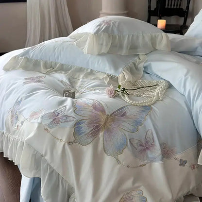 Light blue satin duvet cover bedding set with butterfly embroidery and decorbites french lace ruffled edge detail