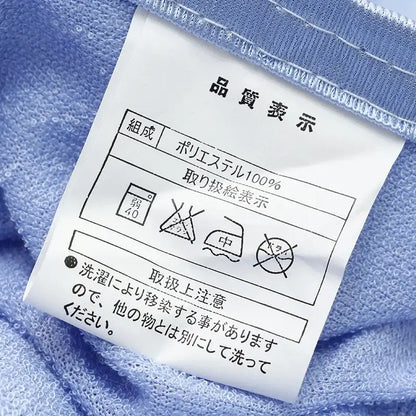 Light blue cool feel summer blanket made of 100% polyester with a soft textured weave and white care label