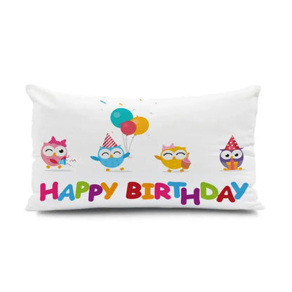 White rectangular pillow with colorful cartoon owls and happy birthday text in light blue dinosaur animal happy decorbites style
