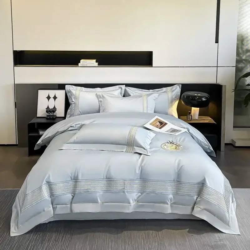 Light blue egyptian cotton embroidery bedding set with satin-like duvet cover featuring gold thread edges and circular motif