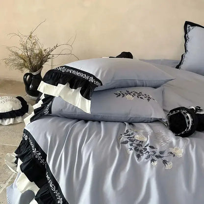 Light blue satin bedding set with black and white flowers embroidery ruffles for elegant bedroom decorbites decor