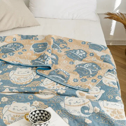 Light blue and gray decorbites cotton gauze summer blanket with beige and blue lucky cat pattern and soft texture