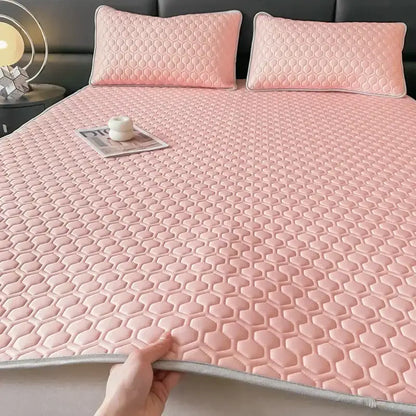 Pink hexagonal quilted bed mat with light gray border latex filled bed mat for cooling bedroom use