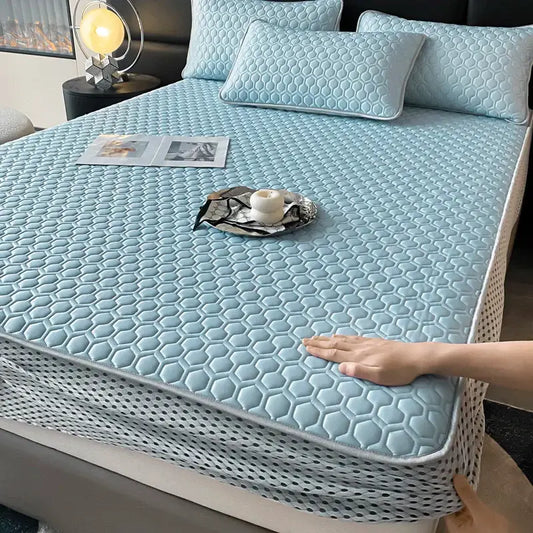 Light blue hexagonal ice silk cooling bed mat set with breathable mesh border for comfortable bedroom use