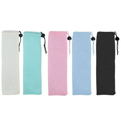 Five cotton linen cutlery cases in white mint green pink light blue and black with drawstring closure by decorbites