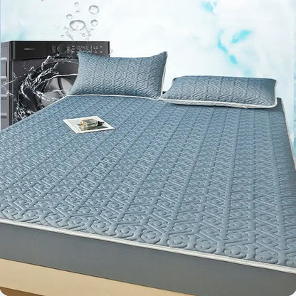 Light blue quilted latex fitted sheet set with matching pillows and gray border for bedroom bed pad