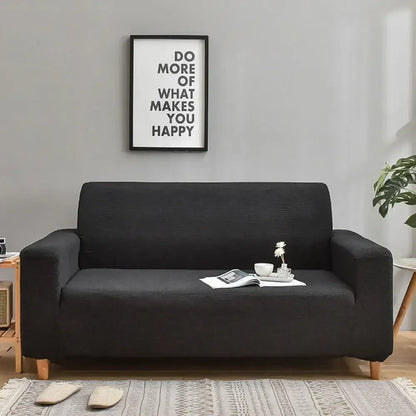 Black textured decorbites 3d quilted thicken sofa cover snugly fitted on modern loveseat with light wooden legs