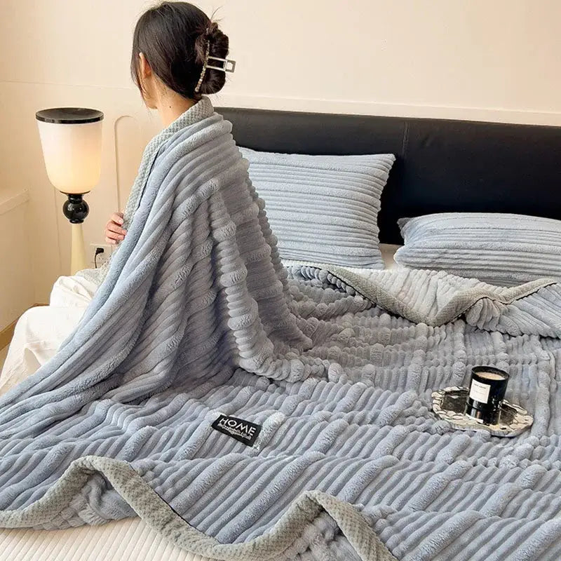 Light blue ribbed cozy faux rabbit plush blanket with soft texture and subtle gray border for bedroom decorbites cozy faux use