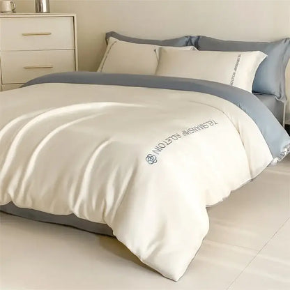 Cream-colored satin duvet cover with subtle gray piping and decorbites cotton embroidery for cotton embroidery bedding set