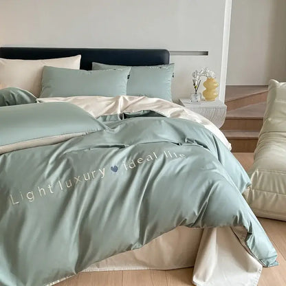Light blue satin embroidery bedding set featuring a soft mint green duvet cover with luxury life embroidery