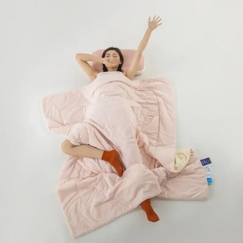 Soft pink quilted blanket with plush texture and subtle stitching details for decorbites cooling fabric summer comforter