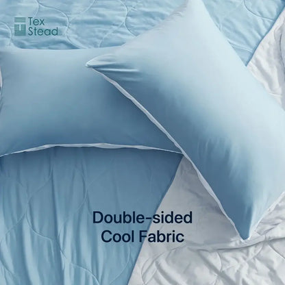 Light blue and white quilted cooling comforter pillowcases with white piping and double-sided cool fabric by decorbites cooling