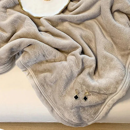 A soft beige plush fleece summer blanket with cozy texture and neatly stitched edges from decorbites coral velvet collection